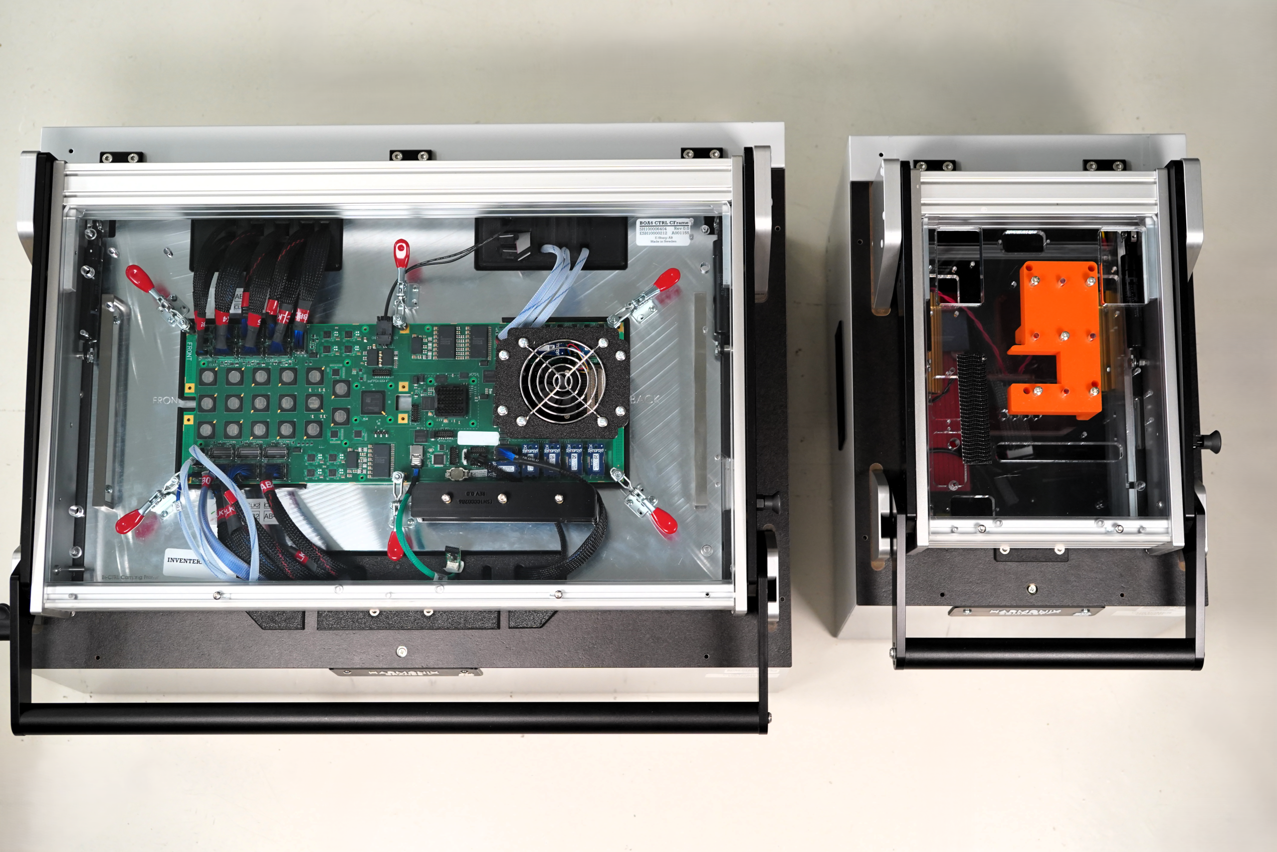 Top-down view of Harmonix Compact and Grande fixtures with boards and instruments inside