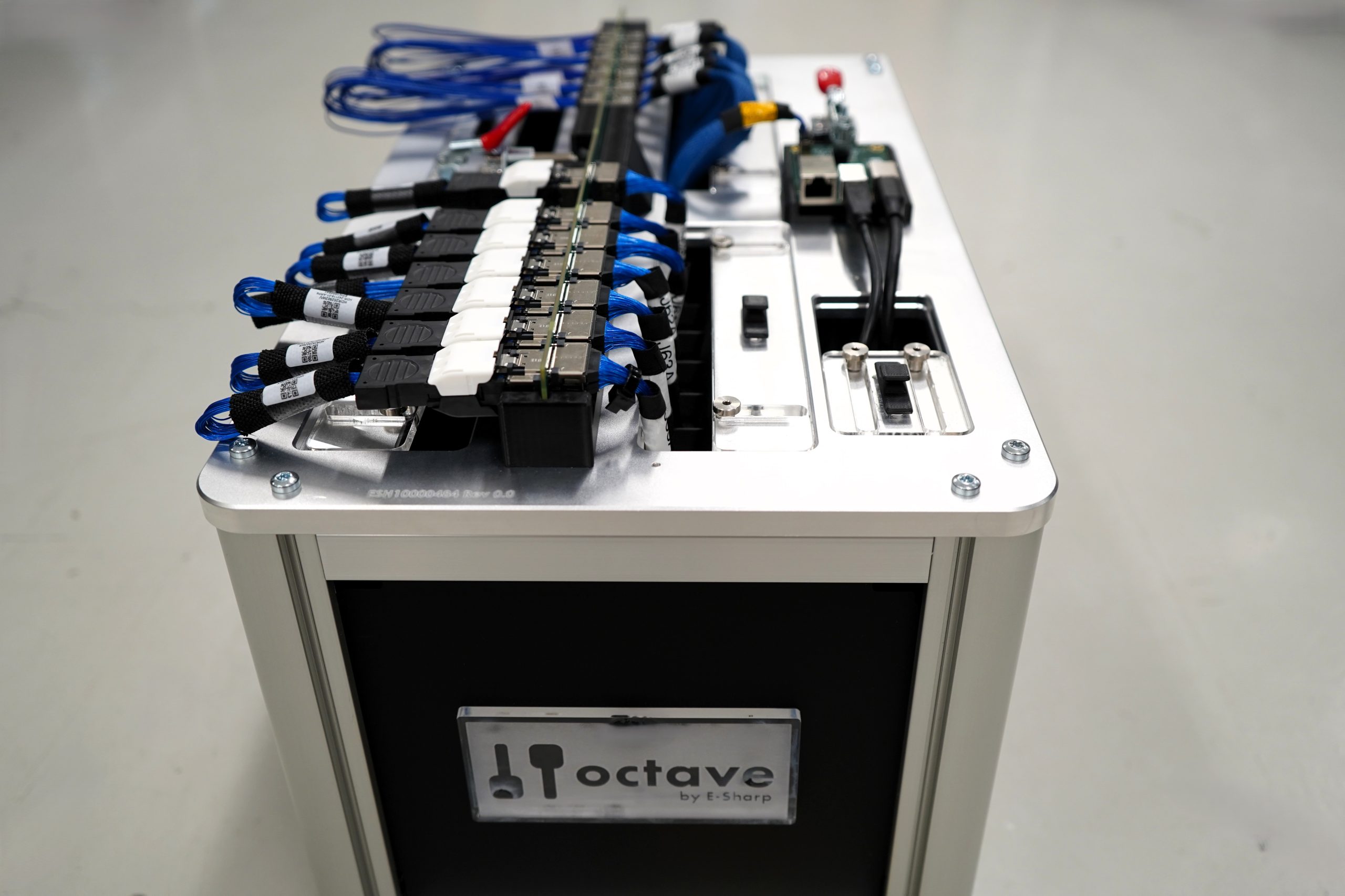 Top of an Octave test station with built-in instruments and connectors for network, keyboard and mouse